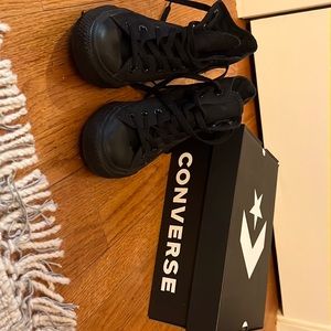 Unisex for men or women all black converse. High tops. Classic style.